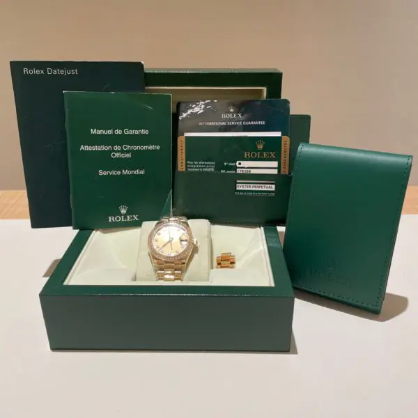Rolex 31mm Datejust “Champagne Dial” 10pts Diamond index Diamond Bezel President bracelet Yellow Gold in box