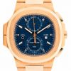 Rose-gold Patek Philippe watch with a blue dial and multiple subdials, close-up view of the timepiece
