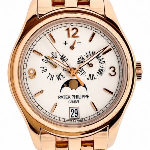 Gold wristwatch with white dial, three subdials, moon phase display, and date window showing 29, Patek Philippe Genève