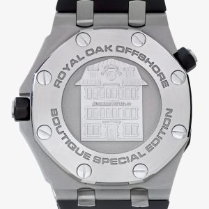 Close-up of a stainless steel Audemars Piguet Royal Oak Offshore watch back with engraved model name and visible screws of the case.