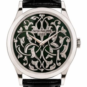 Patek Philippe wristwatch with a green dial and intricate silver floral engravings, silver case, and black leather strap.