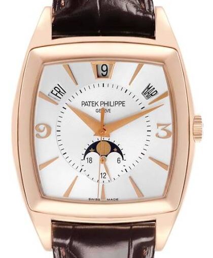 Rose gold Patek Philippe wristwatch with a white dial, day indicators, date window at 12 o'clock, moon phase subdial, and brown leather strap.